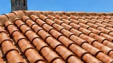 Same terracotta roof clean and orange after soft wash cleaning